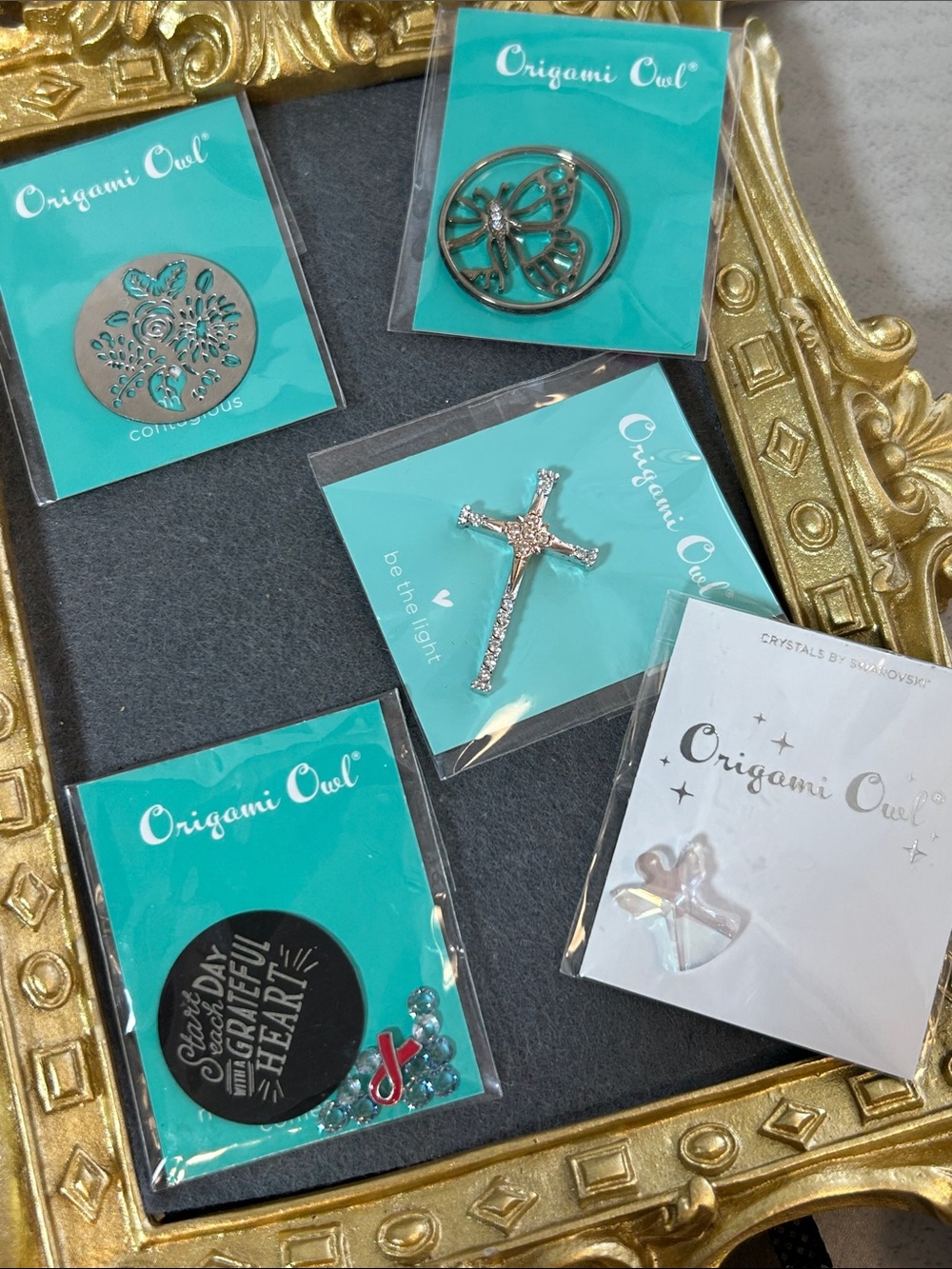 Bundle of Origami Owl Packaged Charms and inserts